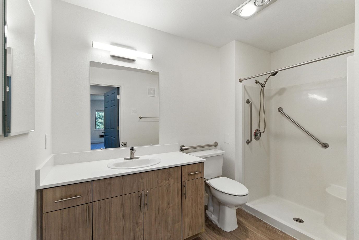 Spacious bathroom with a shower and modern fixtures