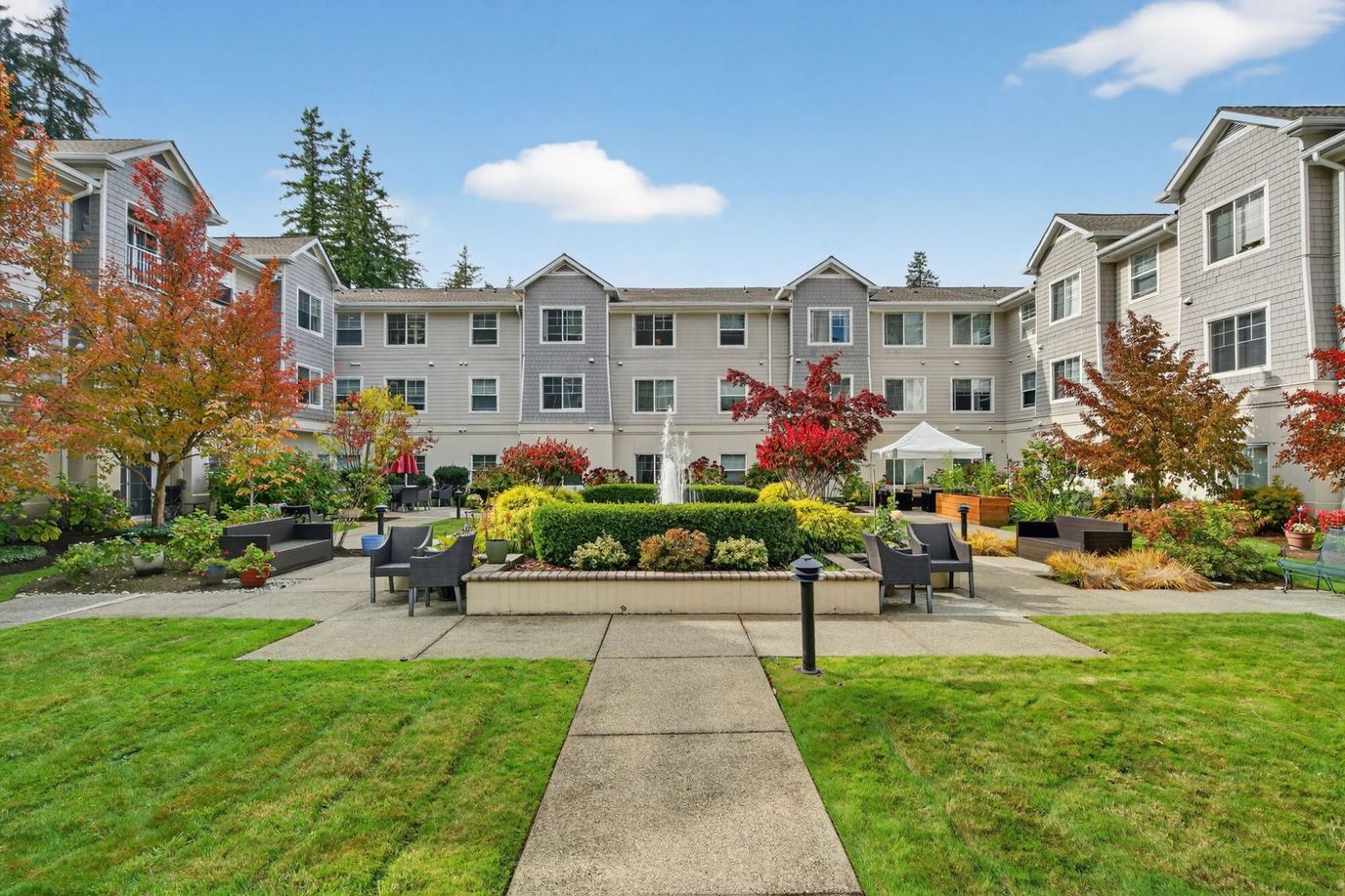 Outdoor courtyard with landscaped garden and seating
