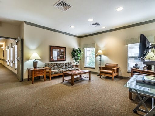 Comfortable common area with seating and natural light
