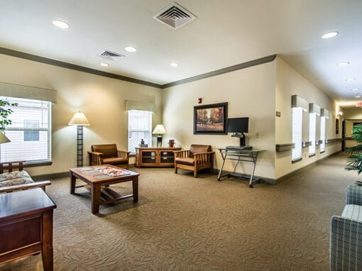 Bright common area with seating and lamps