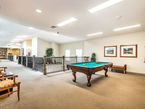 Interior common area with pool table and seating