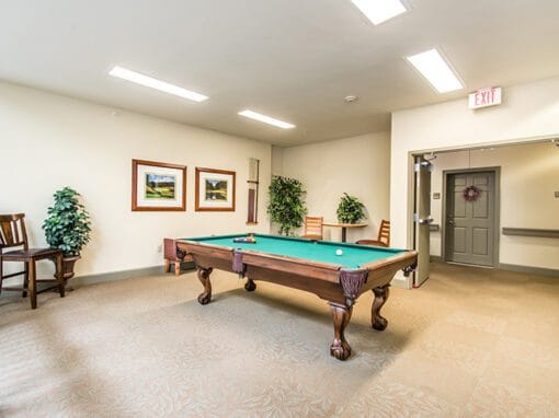 Interior view of a common area with a pool table