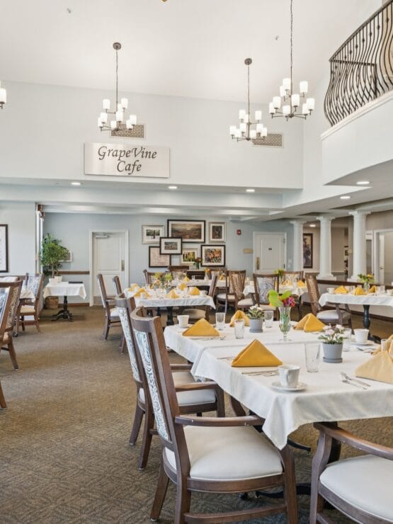 Bright dining room of the GrapeVine Cafe with set tables