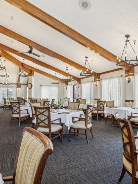 Dining area with elegant seating and decor