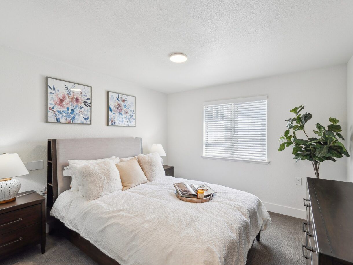 Cozy bedroom with floral decor and a bed