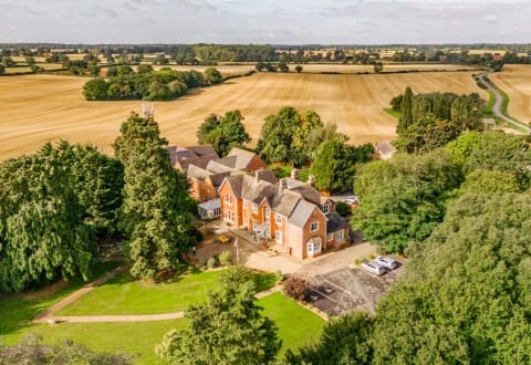 Aerial view of Hadleigh Care Home surrounded by landscape