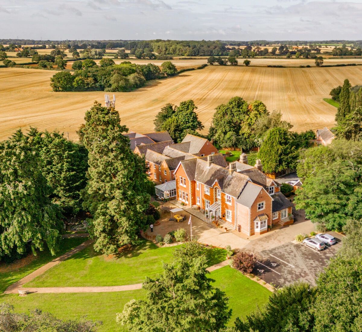 Aerial view of Hadleigh Care Home surrounded by greenery