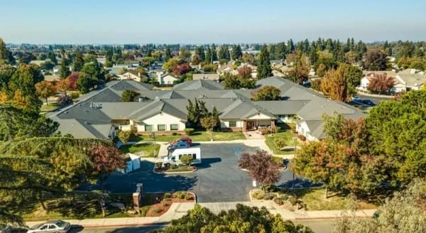 Aerial view of the assisted living facility and surrounding gardens