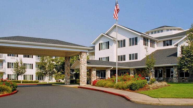 Exterior view of Cadence at Olney with landscaped entrance