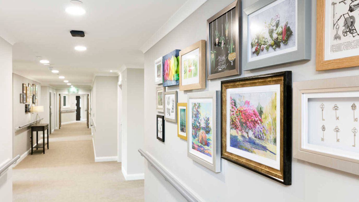 Bright hallway decorated with framed artwork
