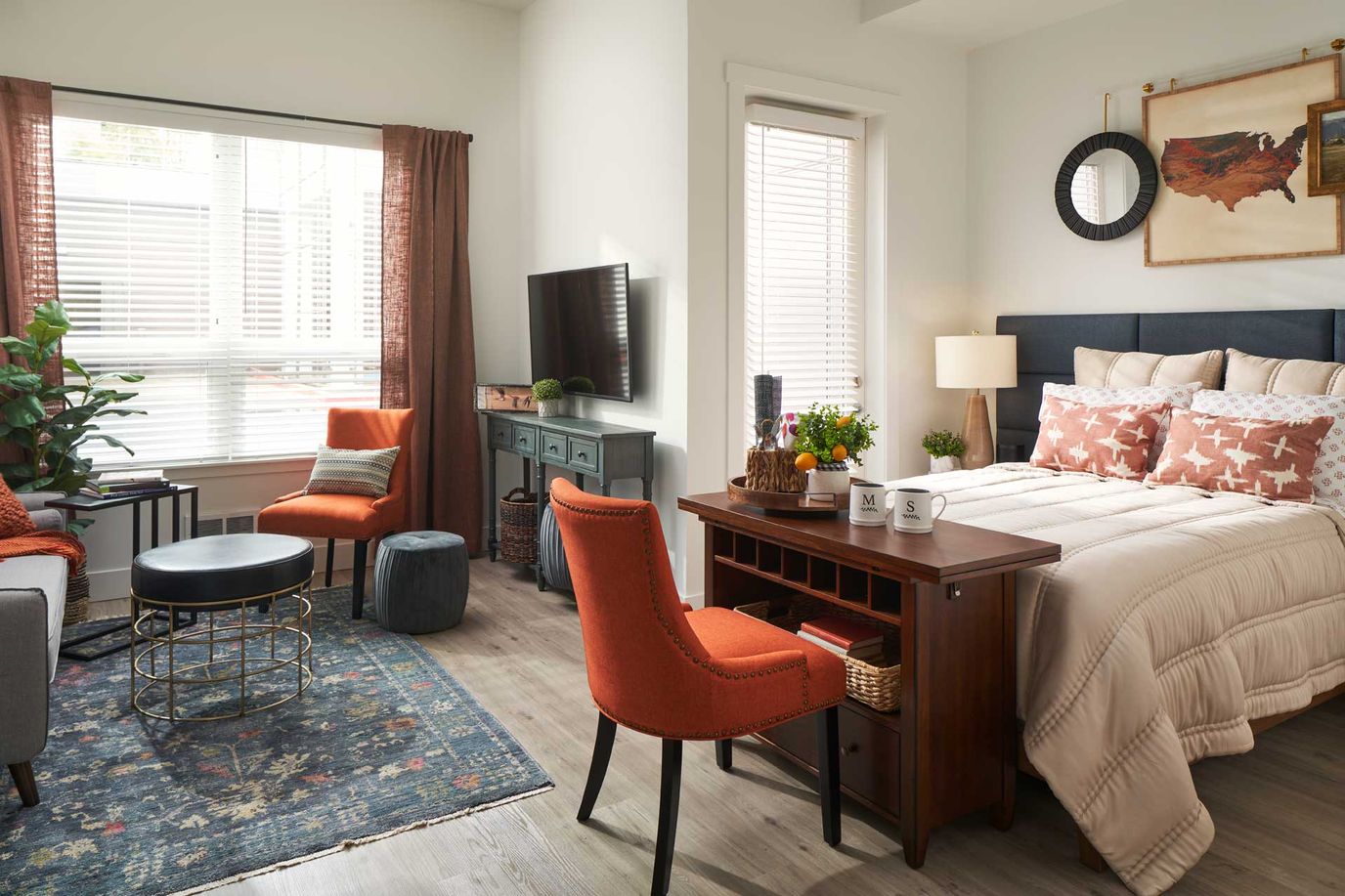Cozy resident room with a bed, desk, and decor