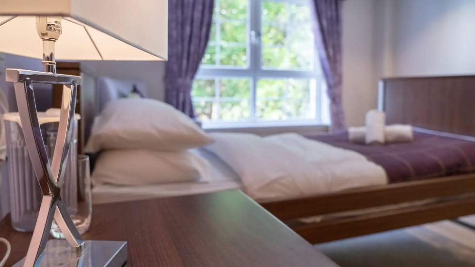 Cozy resident bedroom with warm lighting