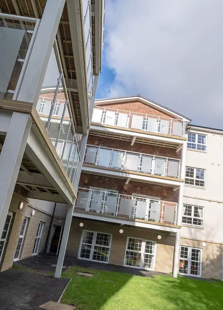 Exterior view of Escan Manor building