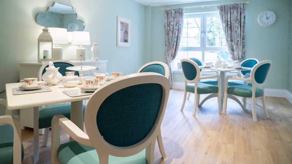 Dining area with elegant decor and sunlight