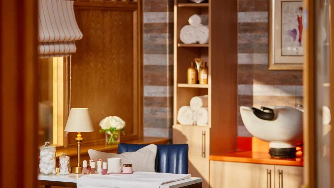 Interior view of a salon area with decor and amenities
