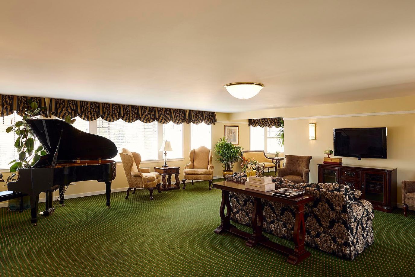 Common area with seating and a piano