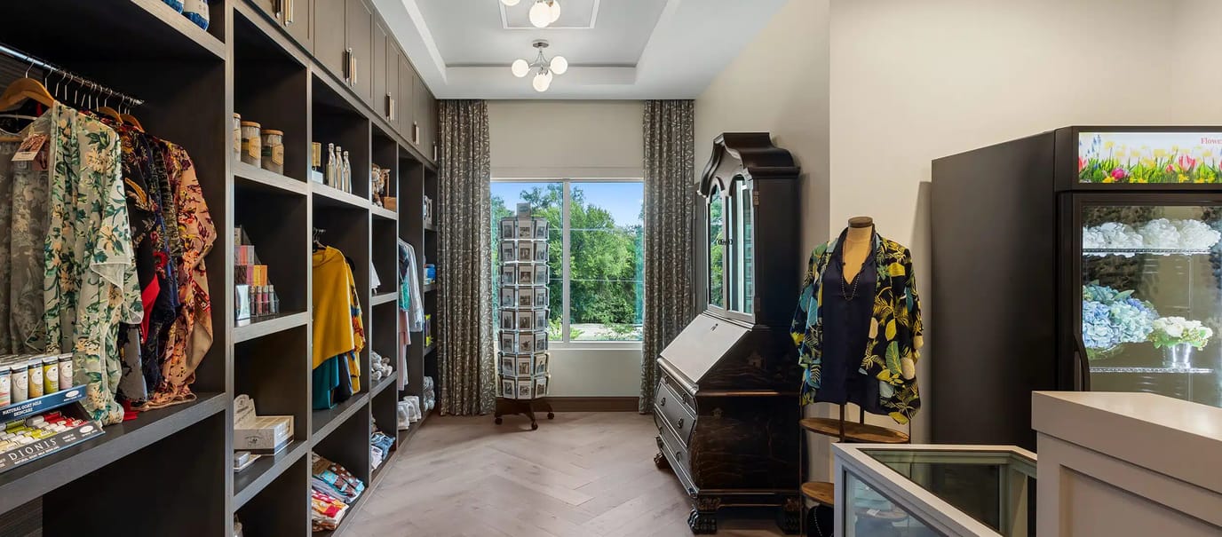 Interior view of a boutique with clothing and decor