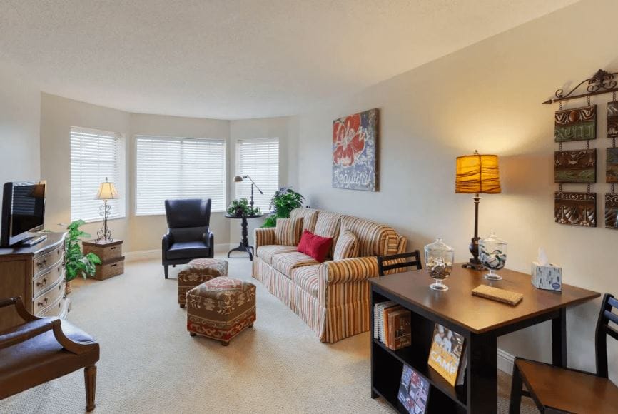 Spacious living room with comfortable seating and natural light