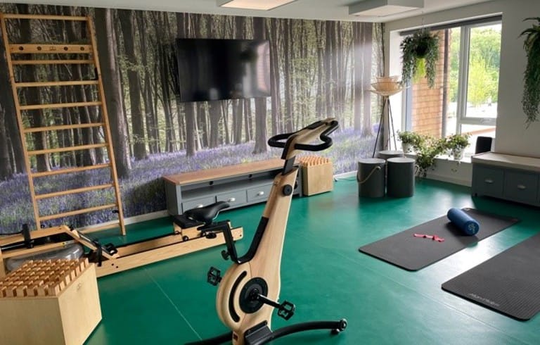 Interior view of a fitness area with exercise equipment