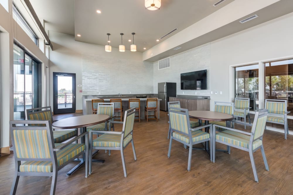 Bright common area with tables and chairs
