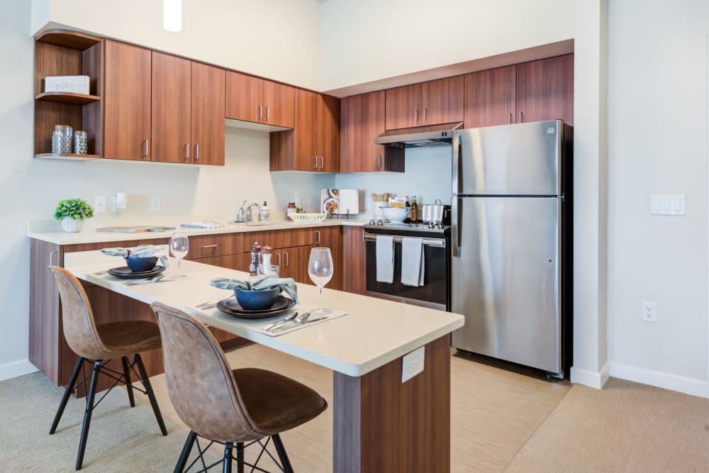 Modern kitchen interior with dining setup