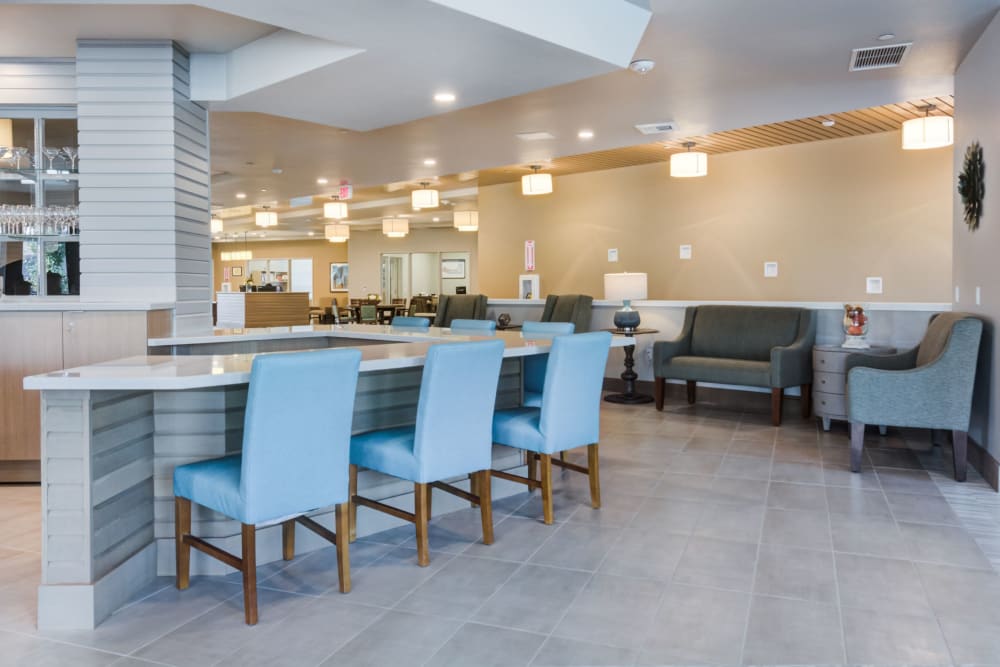 Interior view of a bright common area with seating
