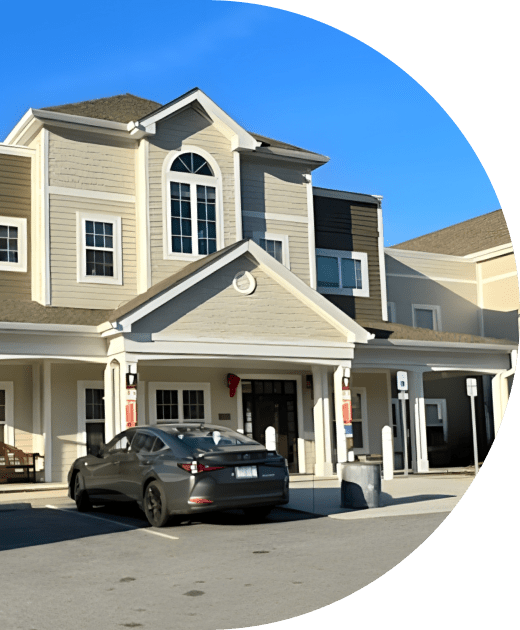 Exterior view of the building with a parked car