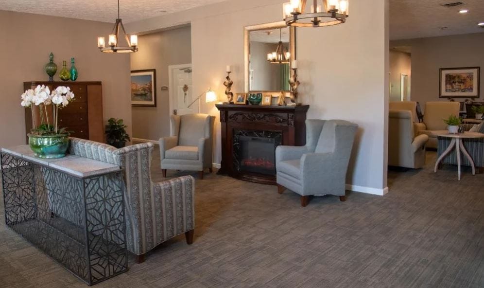 Cozy lounge area with seating and fireplace