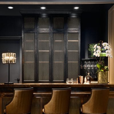 Stylish bar area with seating and decor.