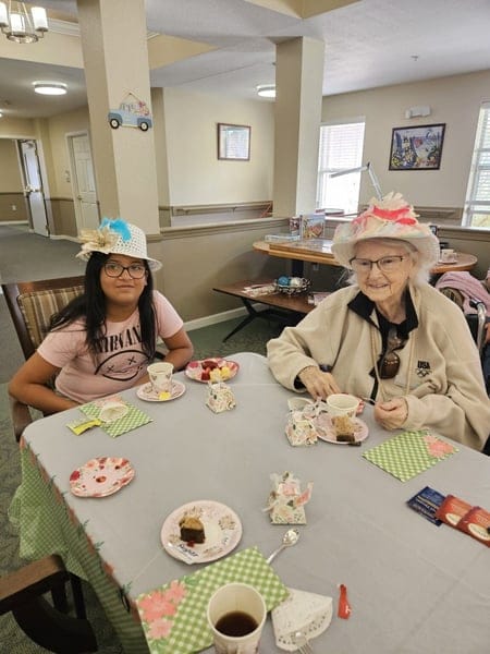 Residents enjoying tea time in a common area