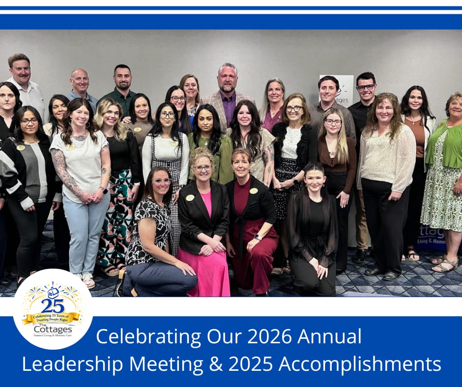 Group photo of staff celebrating accomplishments.