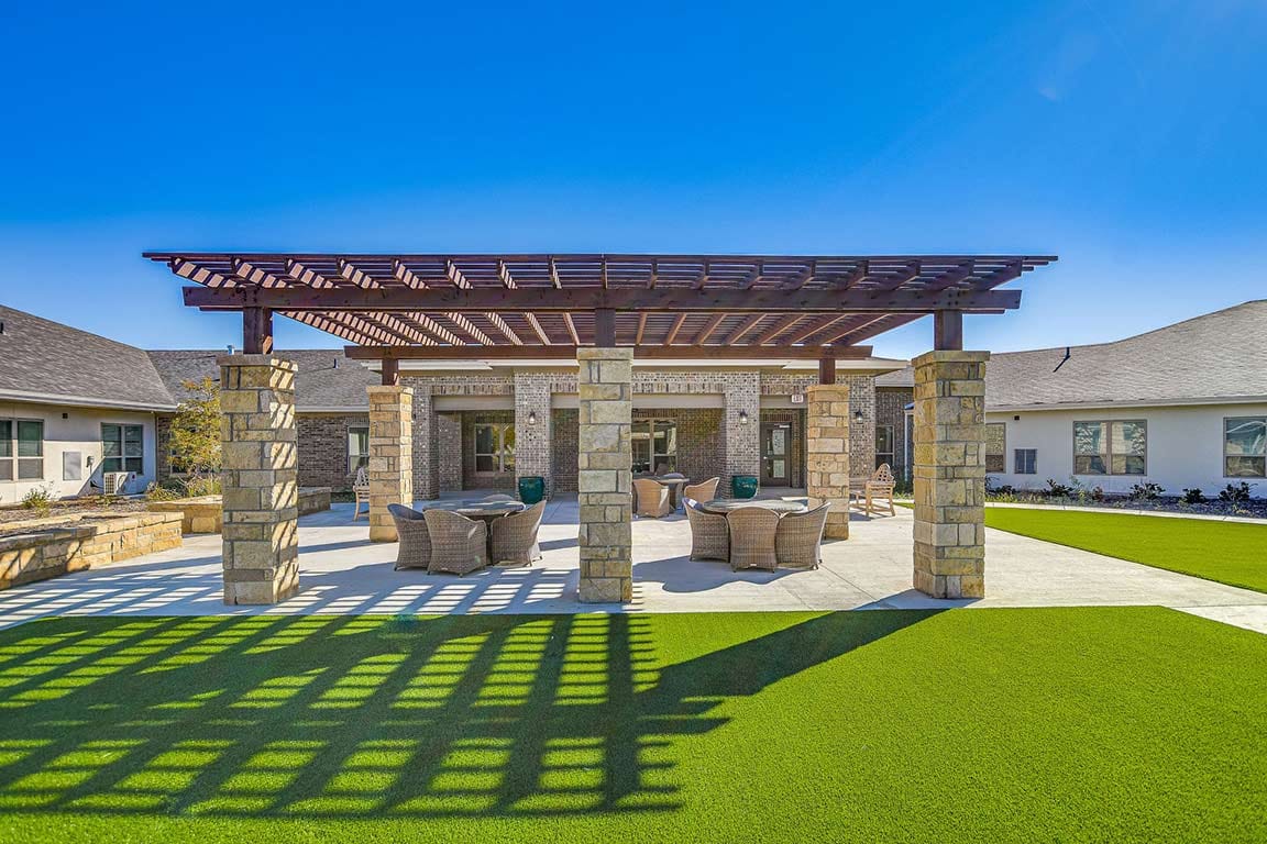 Outdoor gathering area with seating and shade