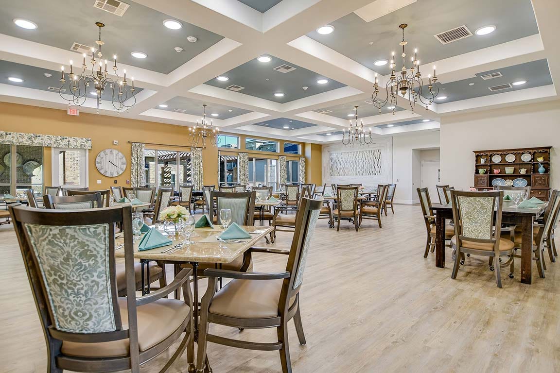 Bright dining area with elegant tables and decorations
