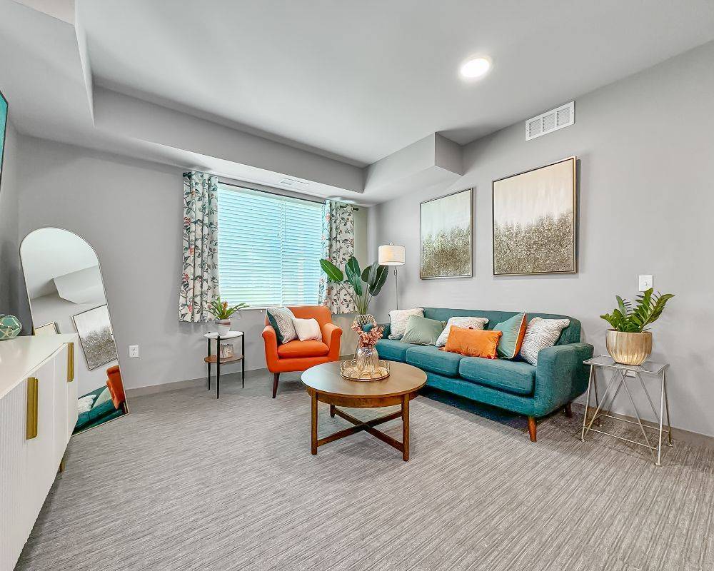 Cozy lounge area with colorful furniture and decor