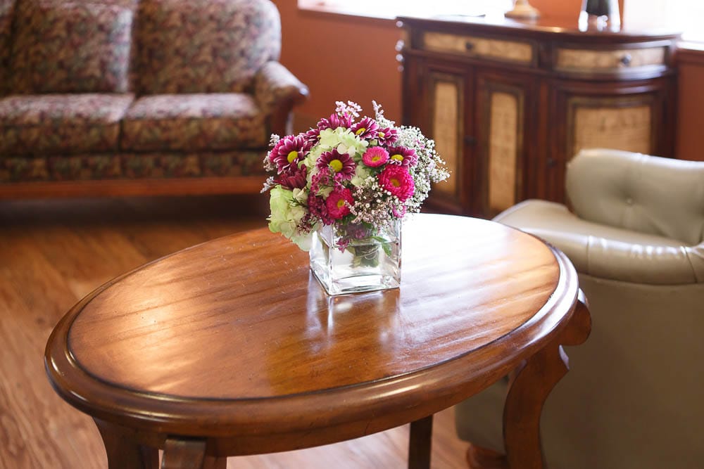 A vibrant flower arrangement on a wooden table