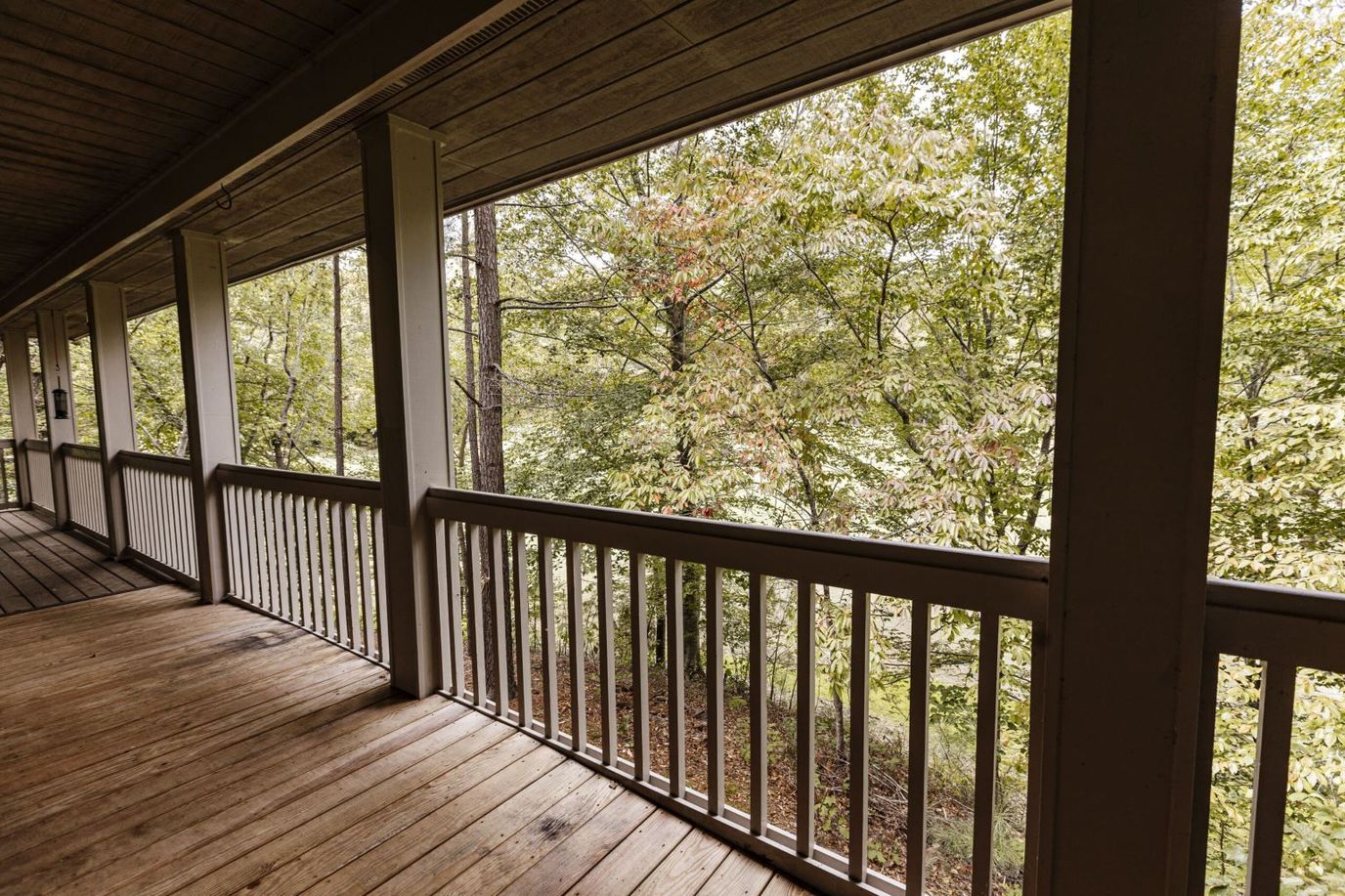 View from a porch overlooking trees