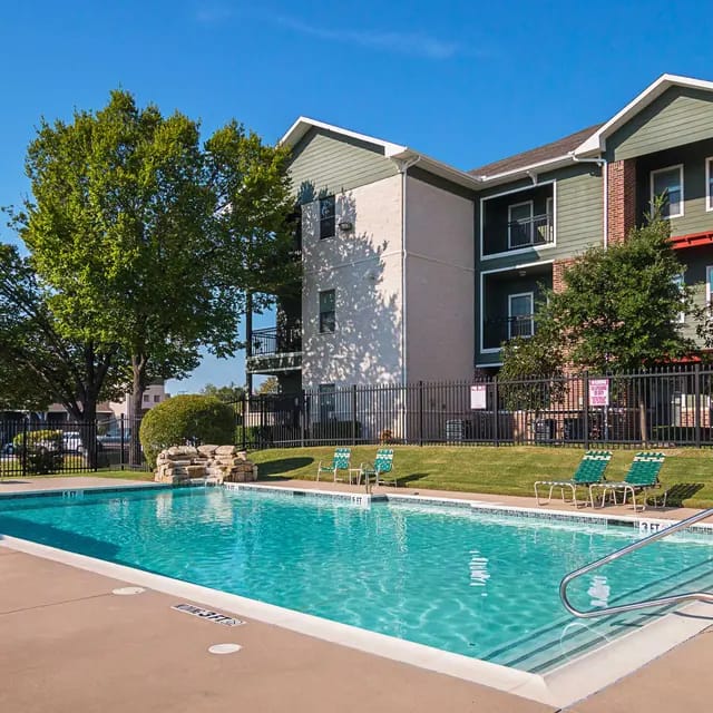 Swimming pool area surrounded by residential buildings
