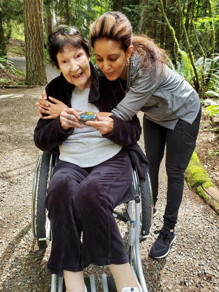 Residents enjoying time outdoors in a forested area