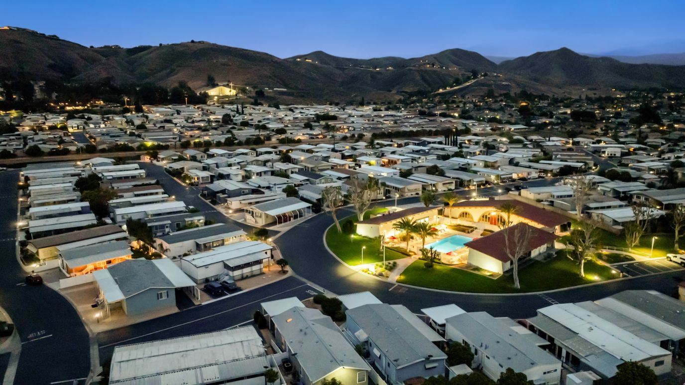 Aerial view of an assisted living community at dusk