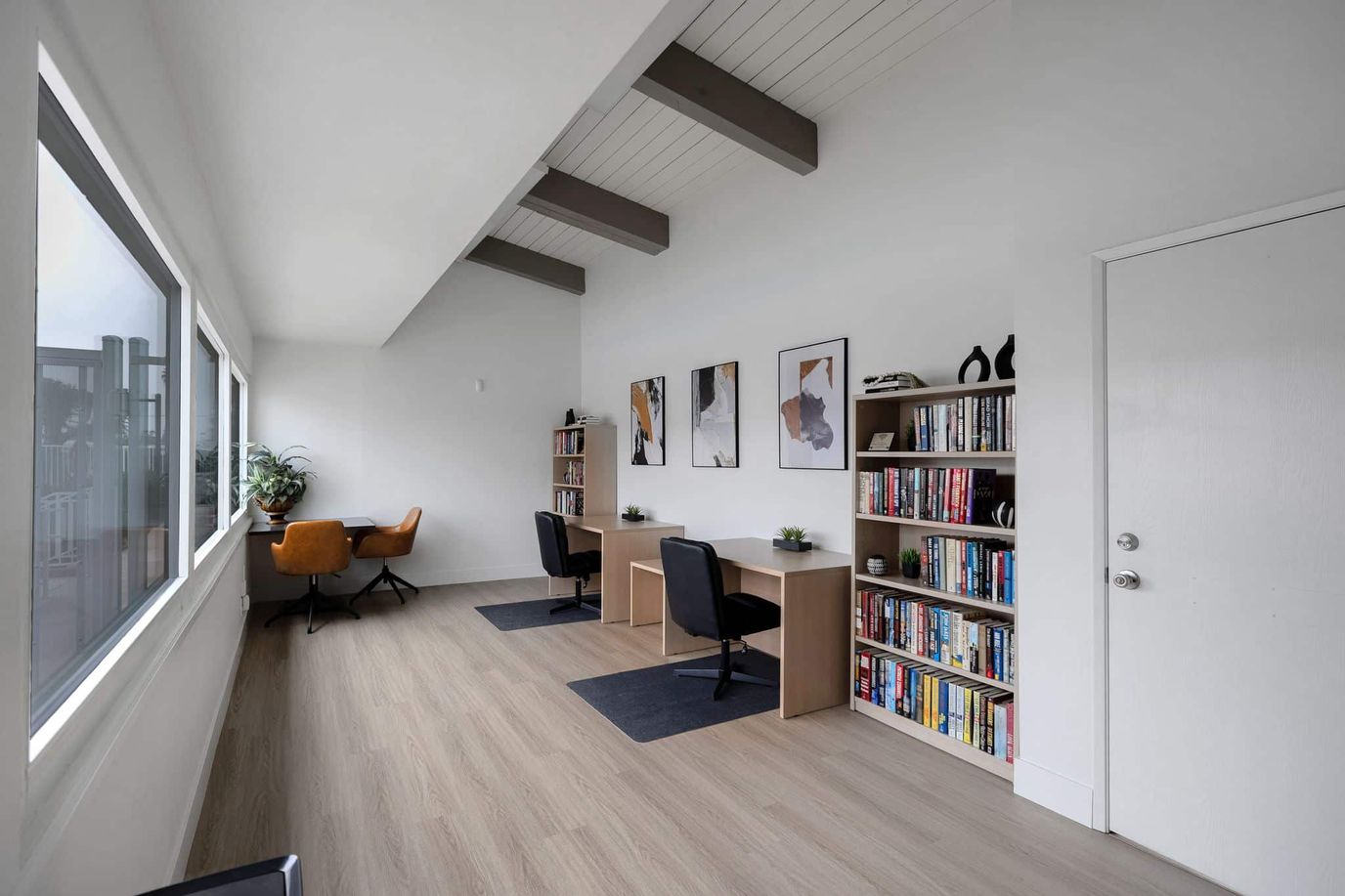 Bright interior space with desks and bookshelves