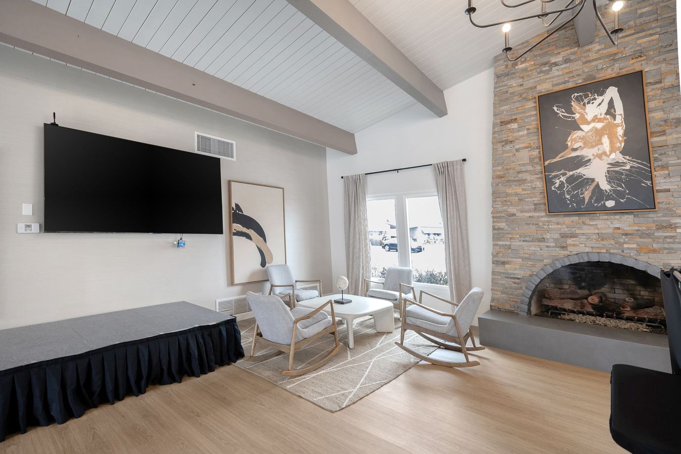 Interior common area with seating and fireplace