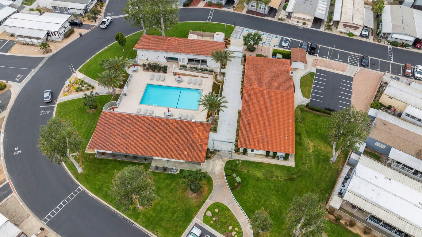 Aerial view of assisted living facility with pool