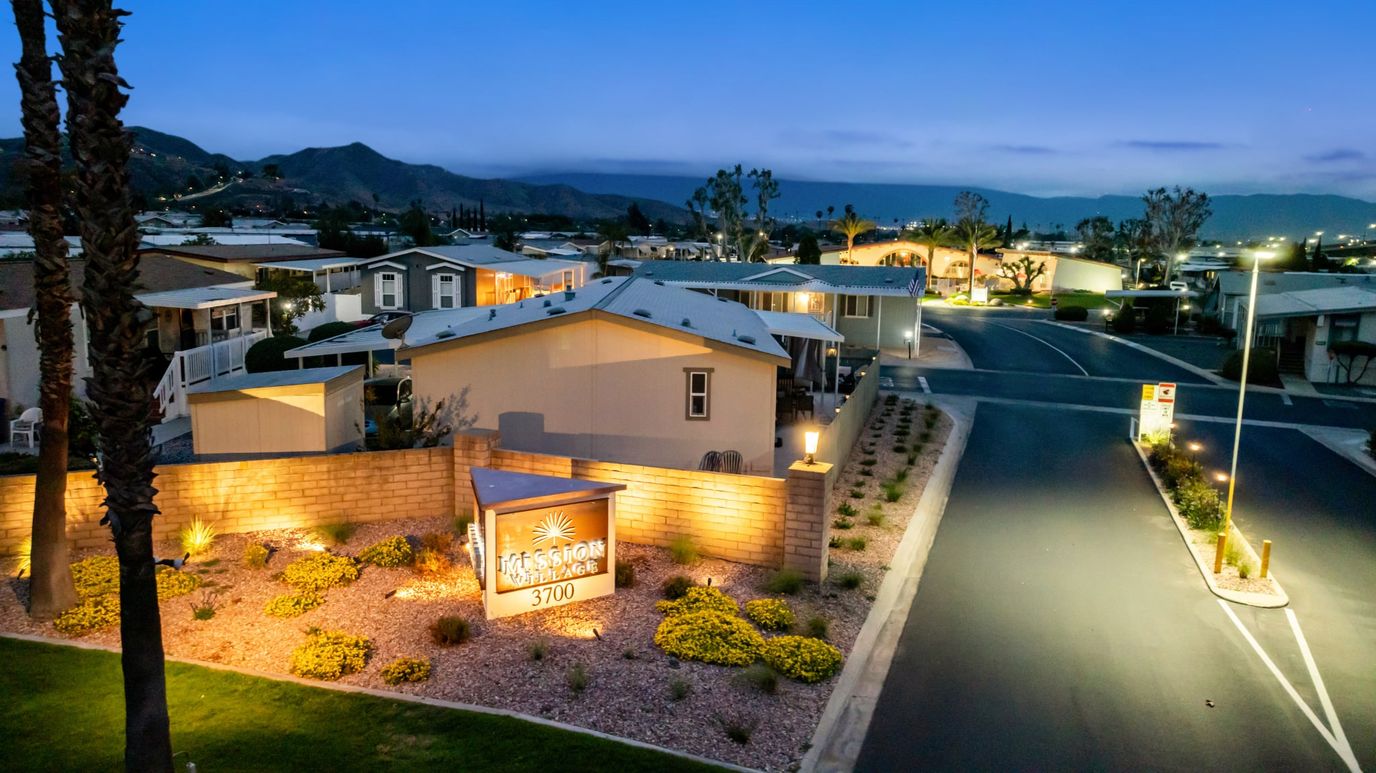 Exterior view of assisted living facility at dusk