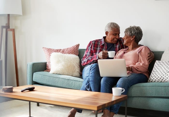 Couple enjoying time together on a sofa