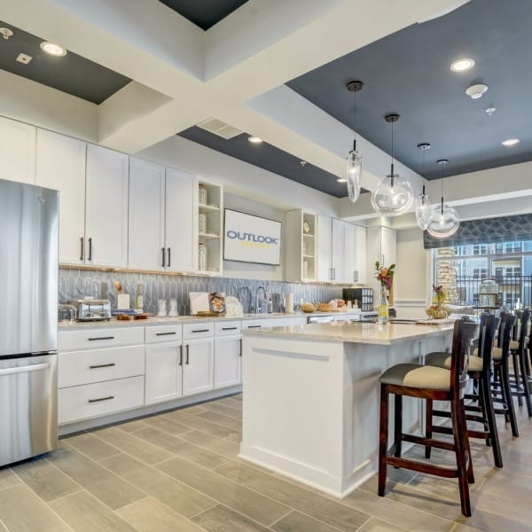 Bright kitchen area with seating and dining space