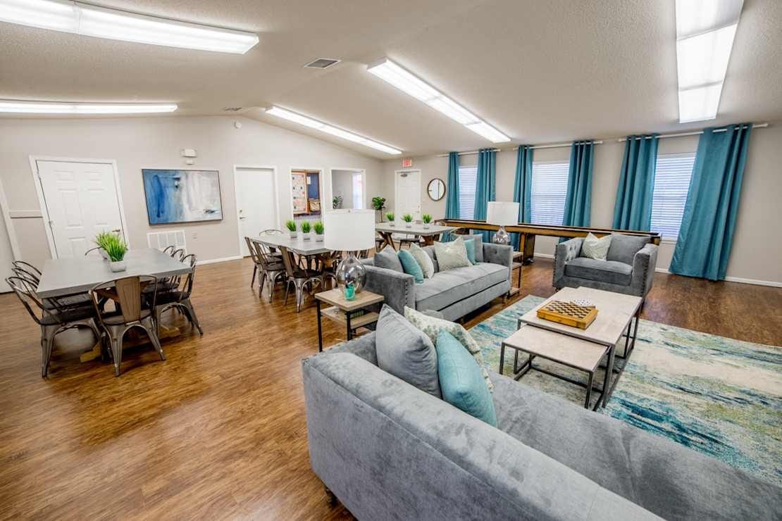 Comfortable communal space with seating and dining tables