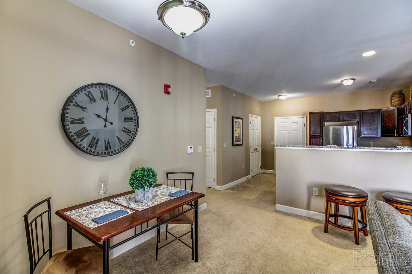 Interior view of a cozy apartment with dining area
