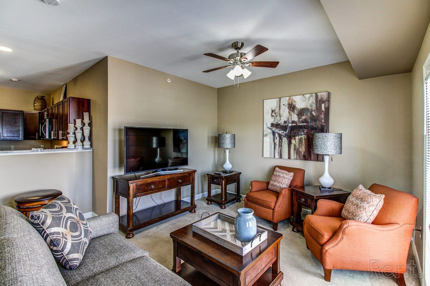 Cozy lounge area with seating and a television