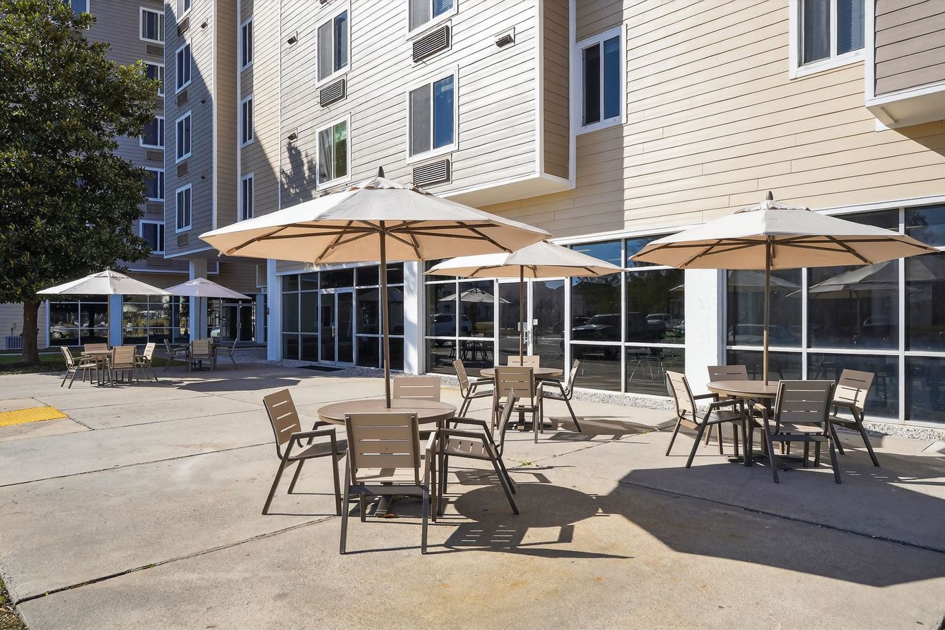 Outdoor seating area with umbrellas and tables