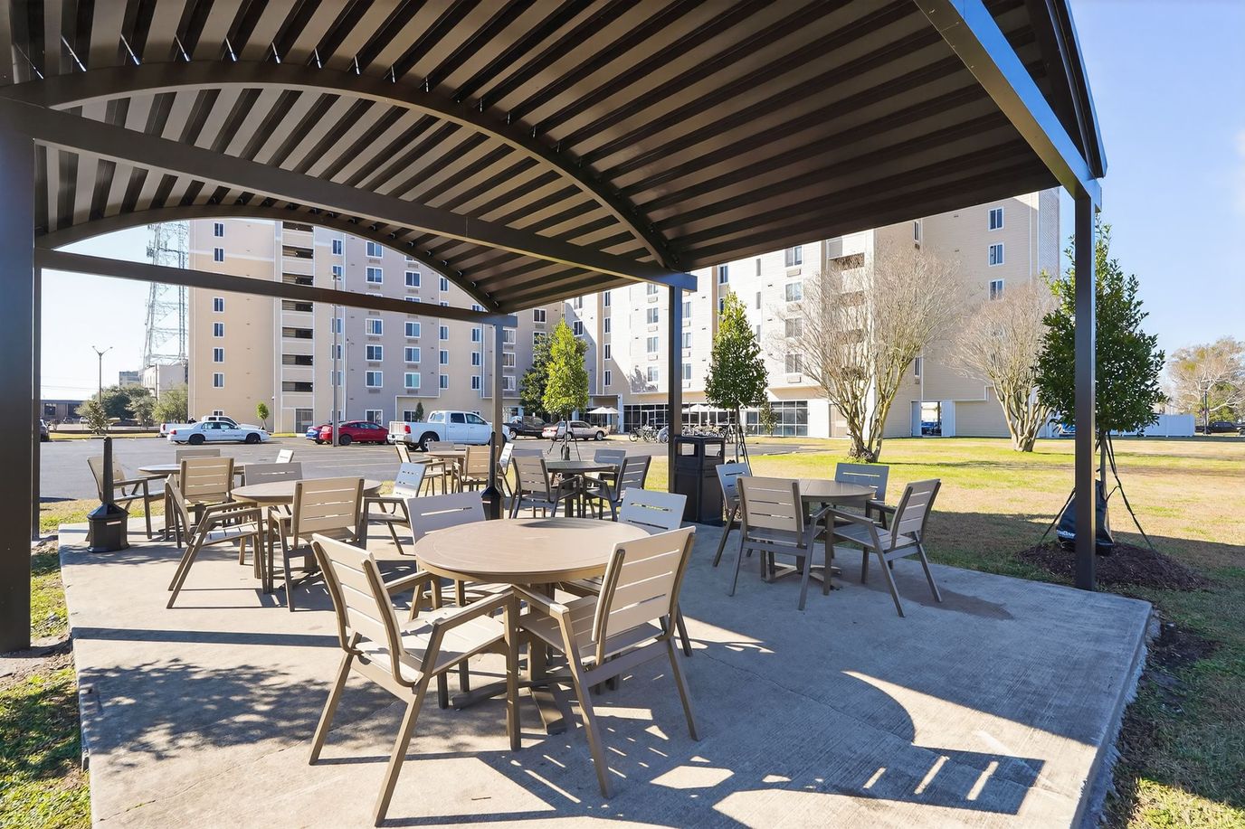 Outdoor seating area with building in background